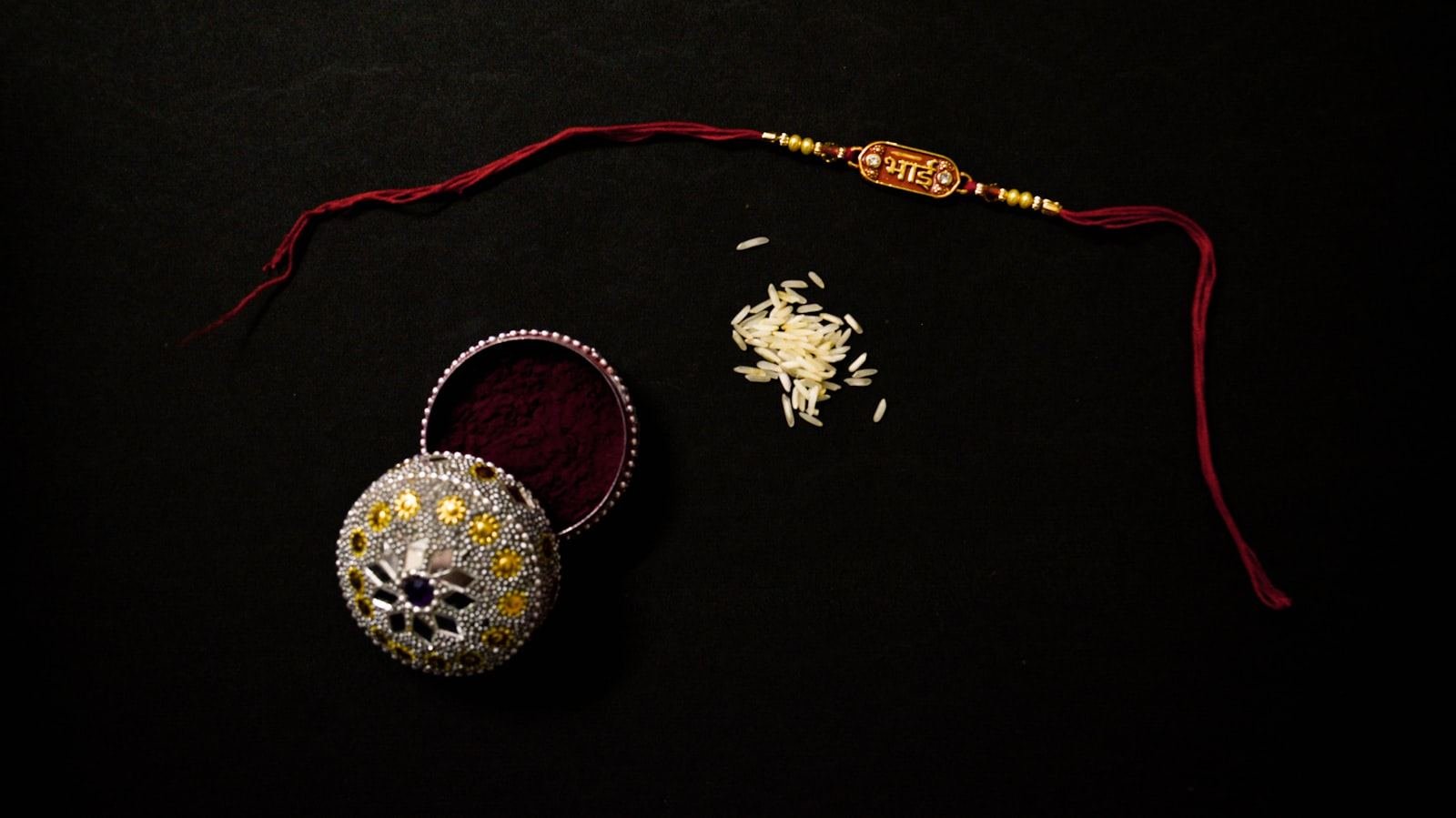 Traditional rakhi with roli and akshat, part of the Raksha Bandhan collection at Tints and Shades by Rachna